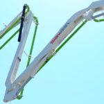 Concrete pump with custom equipment decals and company branding in Toronto