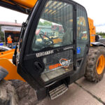 JCB Loadall telehandler with branded decals and company logo applied