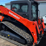 Kubota skid steer with clean vinyl decals and company branding