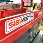 One more scissor lift with custom vinyl decals and company branding details
