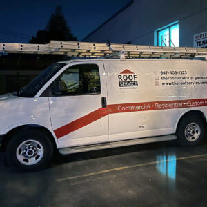 Commercial van wrapped with logo, contact information, and clean branding design